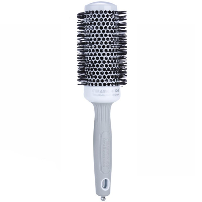 Perie profesională Londa 45mm cu mâner ergonomic din cauciuc siliconat și magnet, pentru uscare rapidă și styling precis. L'Oréa
